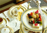 Tea and petits fours on a serving tray at the Peninsula Chicago